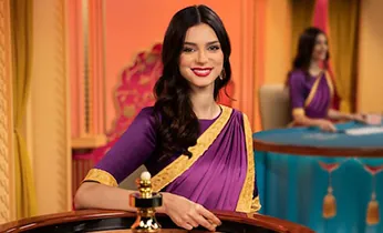 Casino trực tuyến Wibet với bàn Baccarat và dealer xinh đẹp